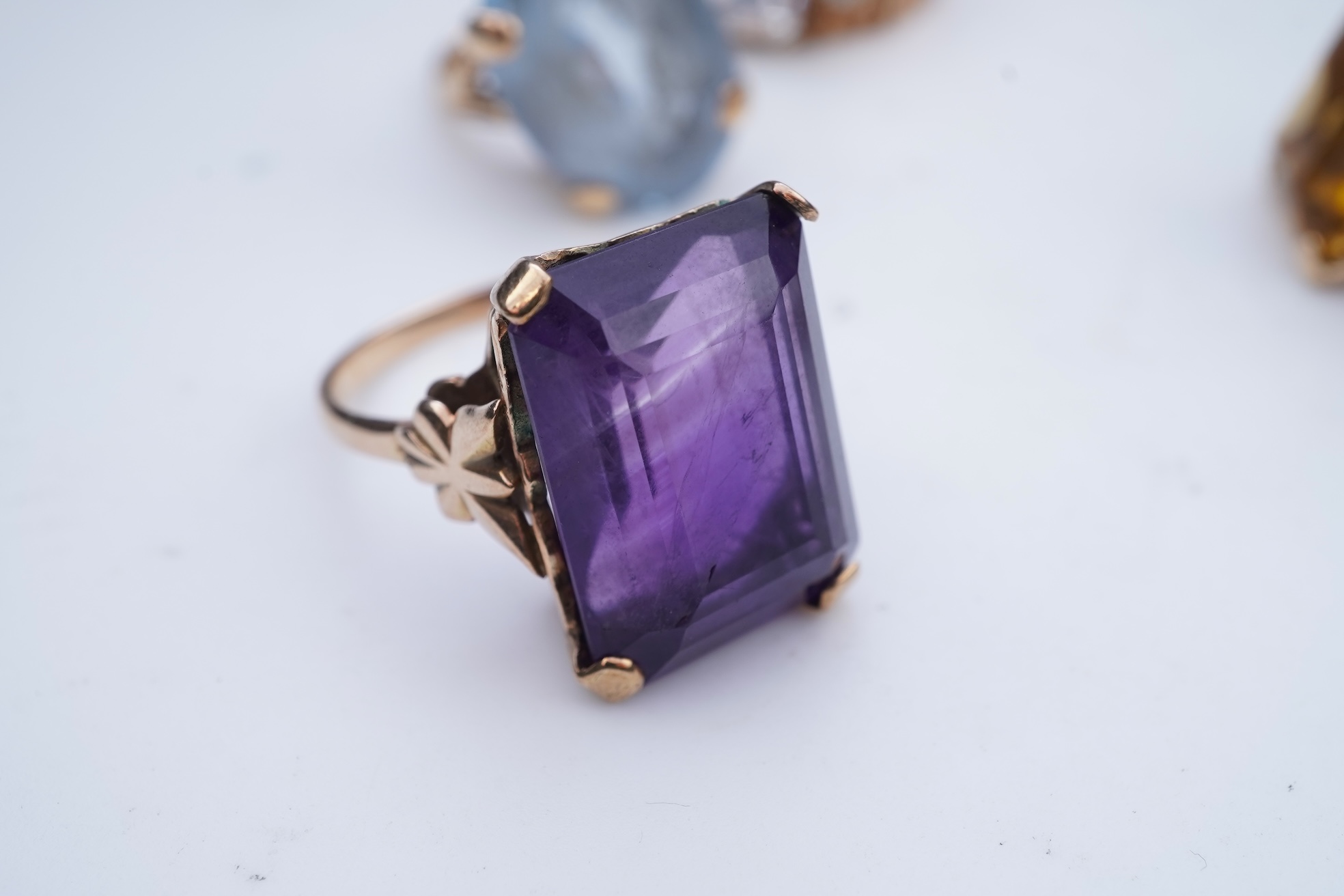 Four gem-set rings
